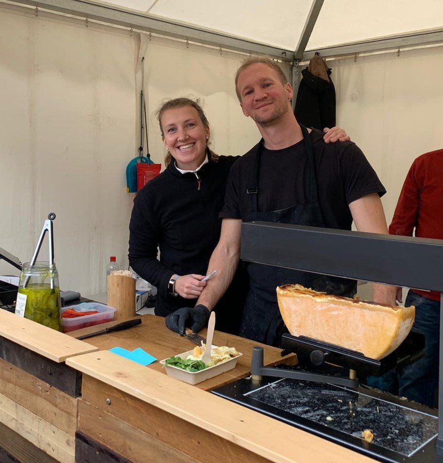 Pete and the team behind the counter at the stall